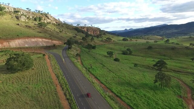Aerial view of car driving through Serro landscape, Brazil