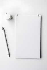 Notebook and pen on the white background