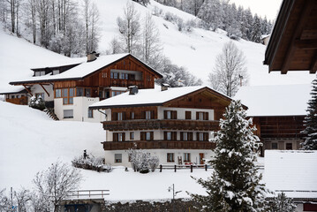 Wooden houses in winter in mountain village