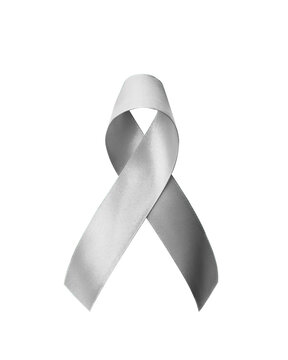 Silver ribbon awareness  on hand isolated on white background (clipping path),  bow color for Parkinson's disease, brain cancer, Schizophrenia, Sciatic Pain, brain disorder and stalking awareness
