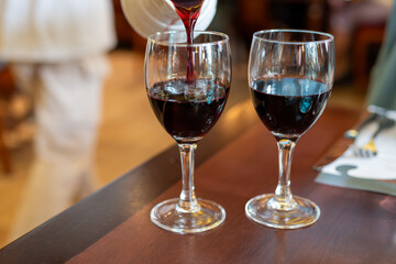 Red dry wine in glasses, lunch with wine in France,  Limouges, France