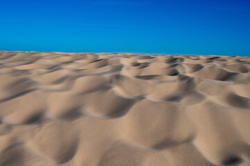 Golden sand and blue sky,  Dune of Pilat tallest sand dune in Europe located in La Teste-de-Buch in...