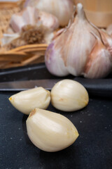 Cooking with dried French garlic. Red garlic. Violet garlic.