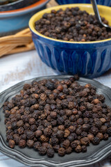 Indian spices collection, dried black peppercorns, kitchen spices