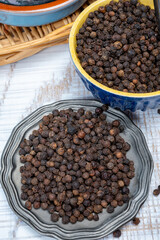 Indian spices collection, dried black peppercorns, kitchen spices