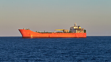 Picture of Fpso vessel - oil tanker in the blue calm sea on a sunny day with clear sky.