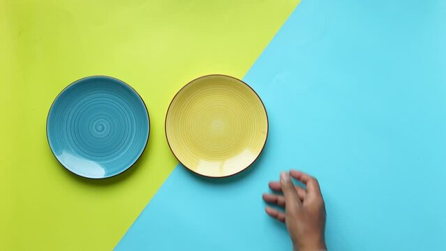 colorful round bowl or ceramic plate on table 
