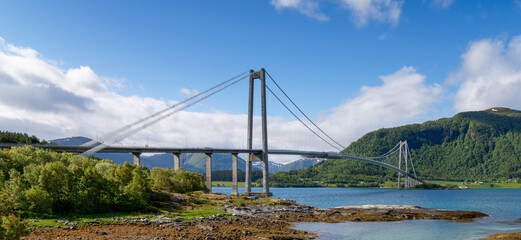 The Gjemnessund Bridge,  Gjemnessundbrua a suspension bridge that crosses the Gjemnessundet strait between the mainland and the island of Bergsoya in the municipality of Gjemnes in Møre og Romsdal