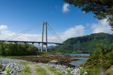 The Gjemnessund Bridge,  Gjemnessundbrua a suspension bridge that crosses the Gjemnessundet strait between the mainland and the island of Bergsoya in the municipality of Gjemnes in Møre og Romsdal