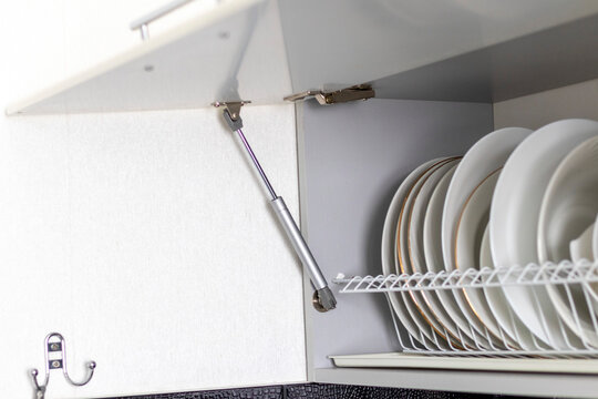 Shot of the gas strut for kitchen cabinet. Household