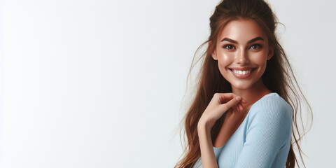 Naklejka premium studio photograph of a fictional happy young woman posing at white studio background