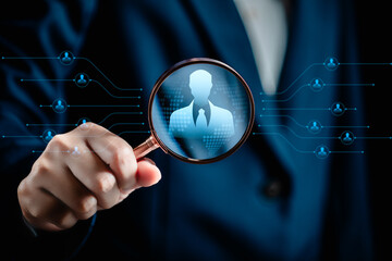 Human Resources Manager using magnifier glass finding with human icons, HRM, CRM, Recruitment...