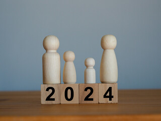 2024 on the wooden block, the beginning of the year for the family.
