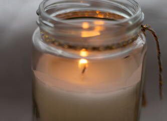 Close up shot of the burning candle. Decoration
