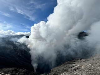 Fototapeta na wymiar volcano in the clouds
