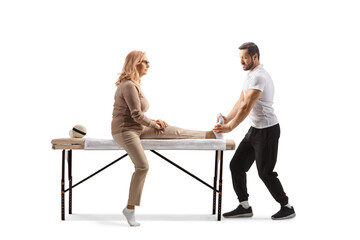 Physical therapist treating a womans foot