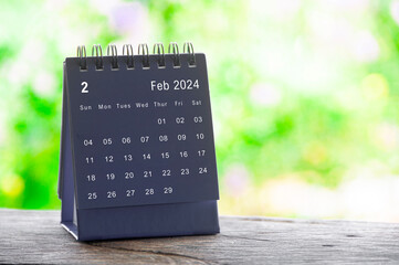 February 2024 table calendar with nature background. Calendar and month concept