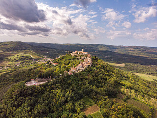 Aerial view of Motovun, a scenic medieval town perched on a green hill in Istria, Croatia