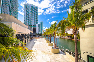 Fototapeta na wymiar Miami river waterfront skyscrapers and walkway view, Florida