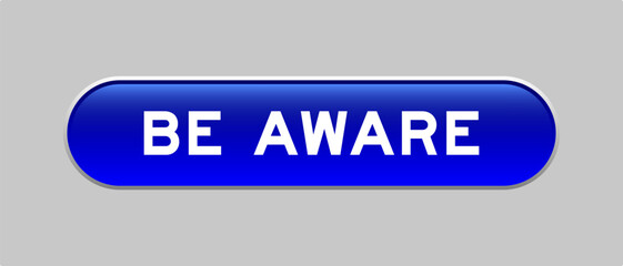 Fototapeta premium Blue color capsule shape button with word be aware on gray background