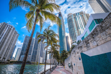 Miami Brickell waterfront walkway and skyline view, Florida - obrazy, fototapety, plakaty