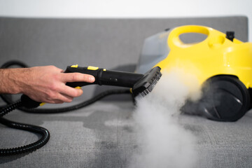 steam generator cleaning sofa with steam - obrazy, fototapety, plakaty
