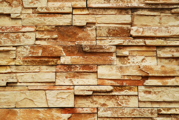 Front View of Brown Rough Stone Blocked Wall