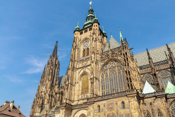 Fototapeta na wymiar The Metropolitan Cathedral of Saints Vitus church with blue sky, Wenceslaus and Adalbert is a Roman Catholic metropolitan cathedral in Prague, The City of a Hundred Spires, Capital of Czech Republic.
