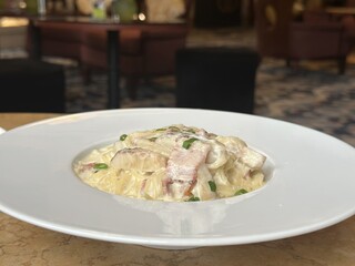 Carbonara spaghetti served in plate. Close up.