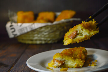 Risoles Mayonnaise or risoles mayo is breaded deep fried pastry make crunchy outside and melted mayonnaise from the inside contain sausage will always be a crowd favourite. selected focus.