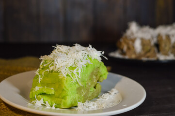 Textured with a focus on Getuk and Getuk Lindri made from processed cassava that is steamed and mashed. Served with grated coconut.