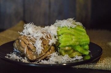 Textured with a focus on Getuk and Getuk Lindri made from processed cassava that is steamed and mashed. Served with grated coconut.
