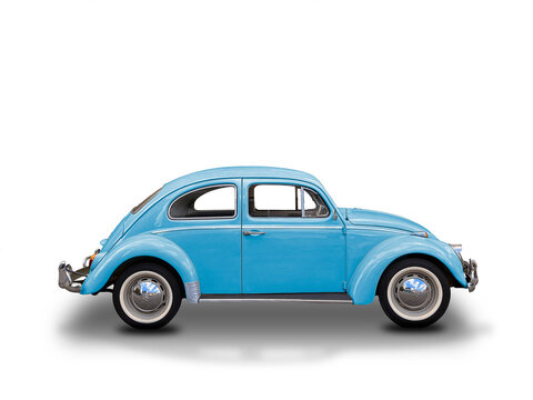 Blue Beetle from the early 1970s. Vintage car cut out on white background.