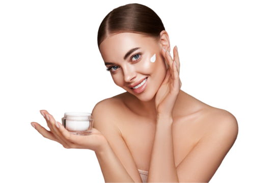 Beauty woman applying cream on her face. Young woman with clean fresh skin. Model with a jar of face cream