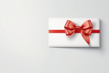 White envelope, gift card with red bow isolated on white background. View from above. Gift card. Birthday. Valentines day.