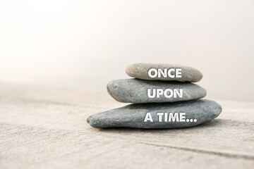 Once upon a time words written on stones. Copy space