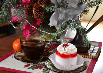 christmas still life with cake and a cup of coffee on the table