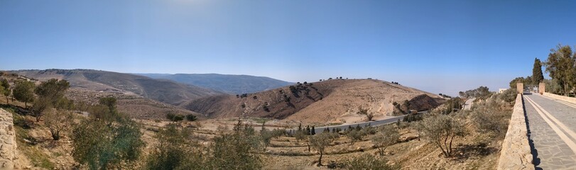 The Memorial church of Moses and the old portal of the monastery at Mount Nebo, Jordan,View from Mt. Nebo