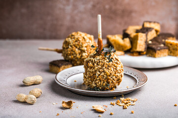 Homemade Caramel Taffy Apple with Peanuts for Halloween