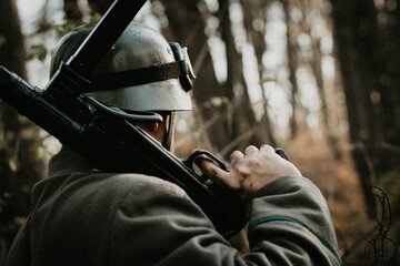 photo of a Wehrmacht soldier against the background of the forest