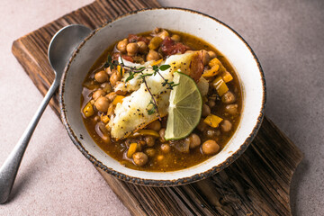 Potaje de vigilia - Chickpea stew with spinach and cod. Typical spanish food for Easter holidays. Chickpea stew with spinach