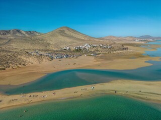 The drone aerial view of Sotavento beach, Costa Calma, Fuerteventura Island, Spain. Sotavento is regarded by many as the best beach on Fuerteventura.