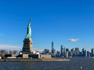 New York, New York – January 11, 2024: the view of the Statue of Liberty from the ferry boat with tourists