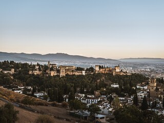 Fototapeta premium Panoramic view of the castle Alhambra in Granada, Andalusia, Spain, during sunset, from the Mirador de la Cruz de Rauda