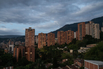 wide cloudy shot of many brick buildings during the sunset in caracas venezuela or other latin...