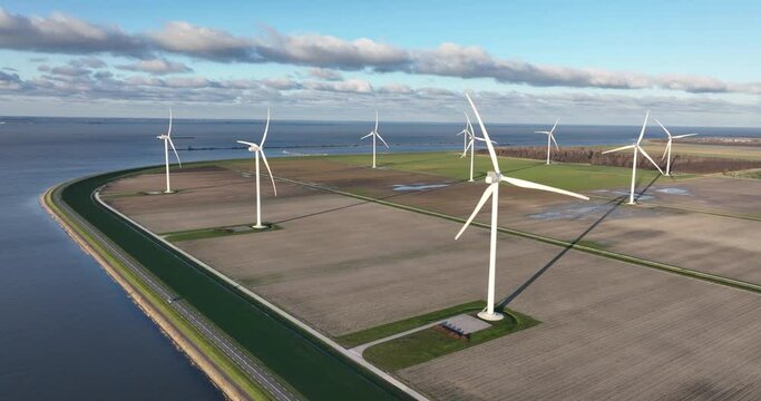 Windturbines, Renewable energy generation, Clean energy and wind power in The Netherlands at Almere, Flevoland. Birds eye view.