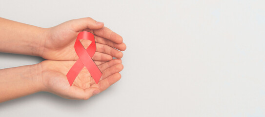 Man holding cancer awareness ribbon