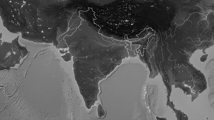 India outlined. Grayscale elevation map