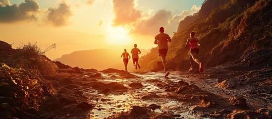 Fitness exercise and couple running in nature by a mountain training for a race marathon or competition Sports health and athletes or runners doing an outdoor cardio workout together at sunset - obrazy, fototapety, plakaty