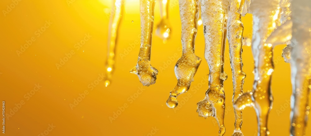 Poster icicles on a yellow background. copy space image. place for adding text